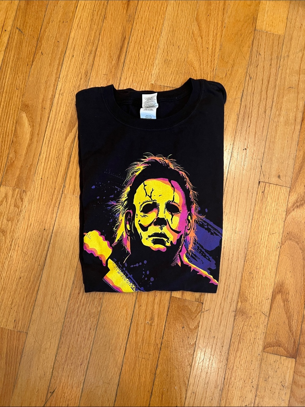 Michael Myers Black Graphic Tee with Neon Horror Mask Print